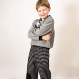 Black and white pied de poule pants with knee patches